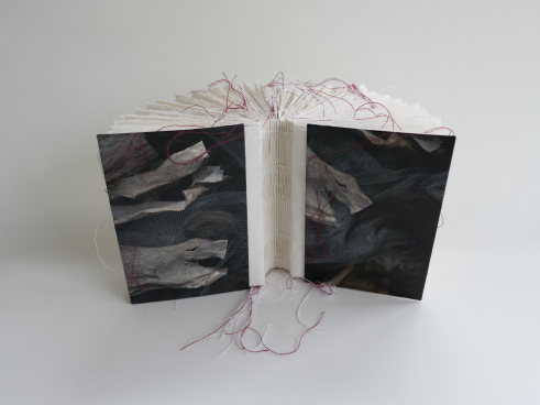 Coptic bound layered book closed
